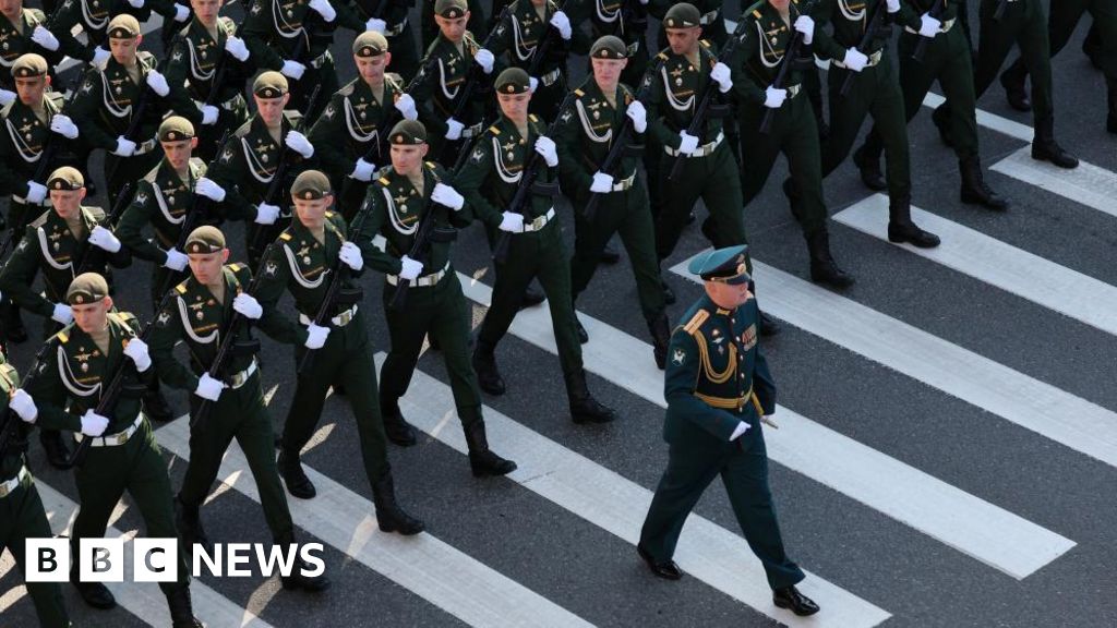 Putin hosts Victory Day parade with tight security and a short ceasefire