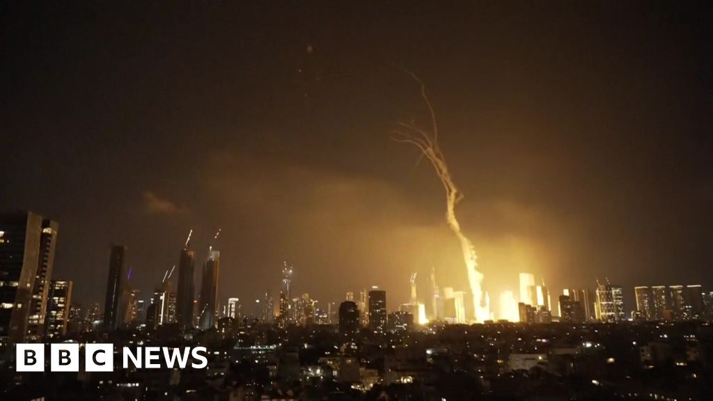 Explosions and huge plumes of smoke in Tel Aviv as Iran retaliates